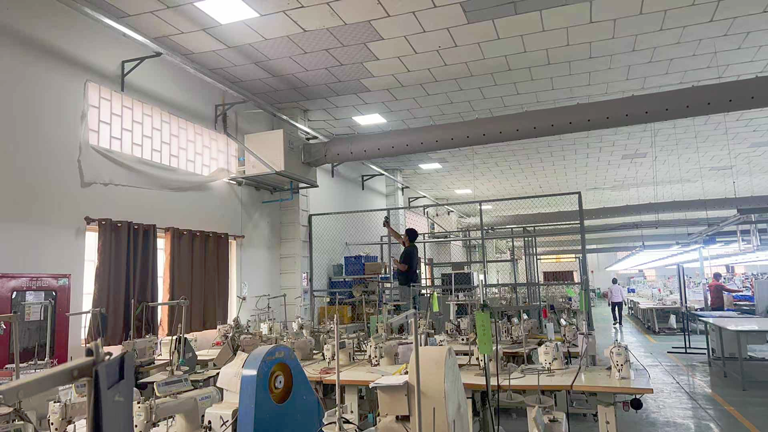 大型制衣廠區(qū)域降溫，應用蒸發(fā)冷省電空調-臥式管道空調機組